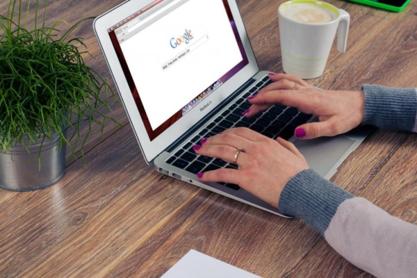 Google Seo - a woman using a laptop computer